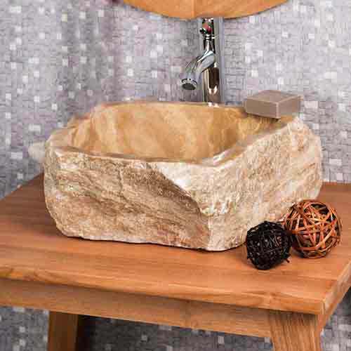 Raw stone basin carved for sale by buying agent in Indonesia to Bali sourcing export. 