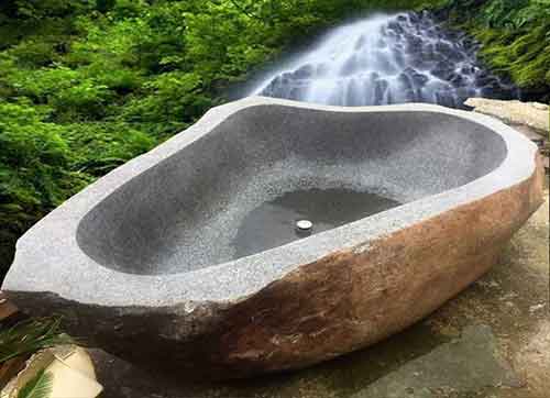 Large stone carved basin for sale by export agent and buying in Bali in Indonesia export.