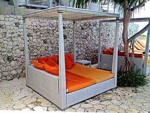 Synthetic rattan outdoor sofa beds for sale in Bali by agent sourcing Indonesia.