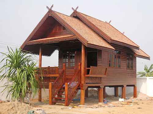 Stilt wooden bungalow house located on an Indonesian beach by buying agent Indonesia for Indonesian export Bali Java