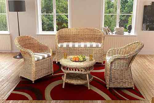 Living room sofa, armchairs and coffee table in natural rattan for sale in Bali by agent sourcing Indonesia.