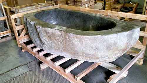 Sourcing for large cut stone bathtub for sale by buying and export agent in Bali Indonesia.